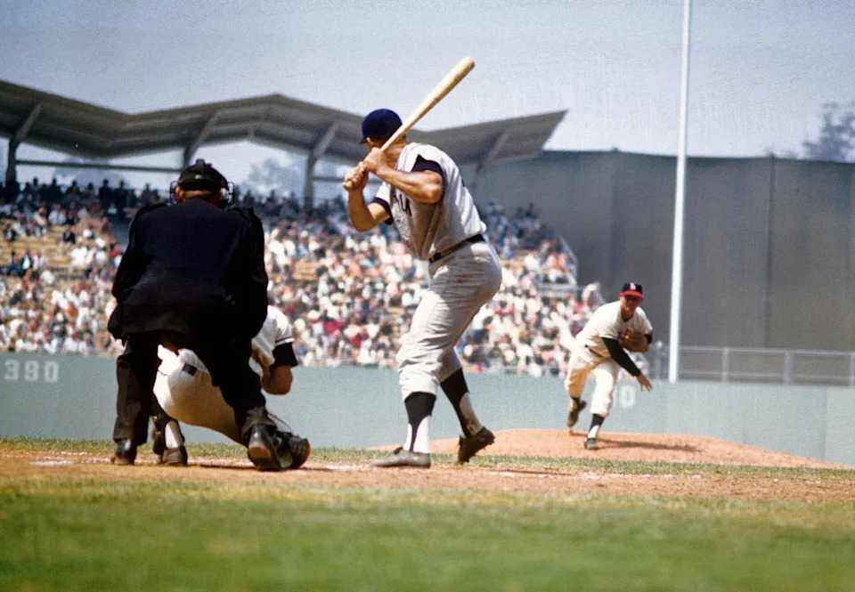 Jul 14, 1962; Los Angeles, CA, USA; FILE PHOTO; New York Yankees outfielder Mickey Mantle (7) follows through on a hit against the Los Angeles Angeles at Dodger Stadium.