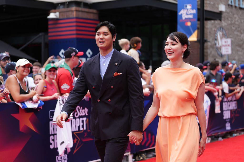 Shohei Ohtani and his wife Mamiko Tanaka walk the red carpet prior