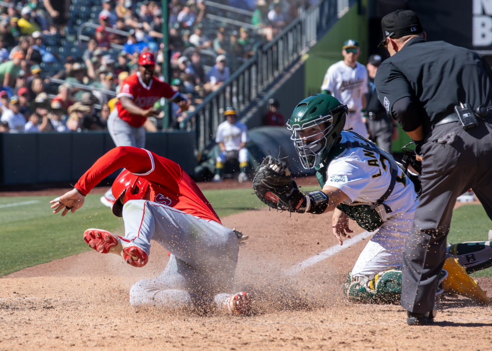 The Los Angeles Angels’ Taylor Ward scores on an infield ground ball during the 10th inning of the Angels 11-5 win at Sutter Health Park on Aug. 17.