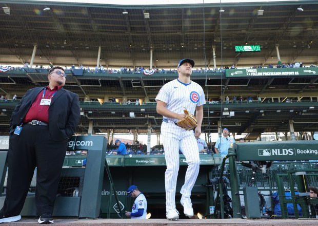 Cubs starting pitcher Jameson Taillon heads to the bullpen to warm up for the NLDS Game 3 against the Brewers at Wrigley Field on Oct. 8, 2025, in Chicago. (John J. Kim/Chicago Tribune)
