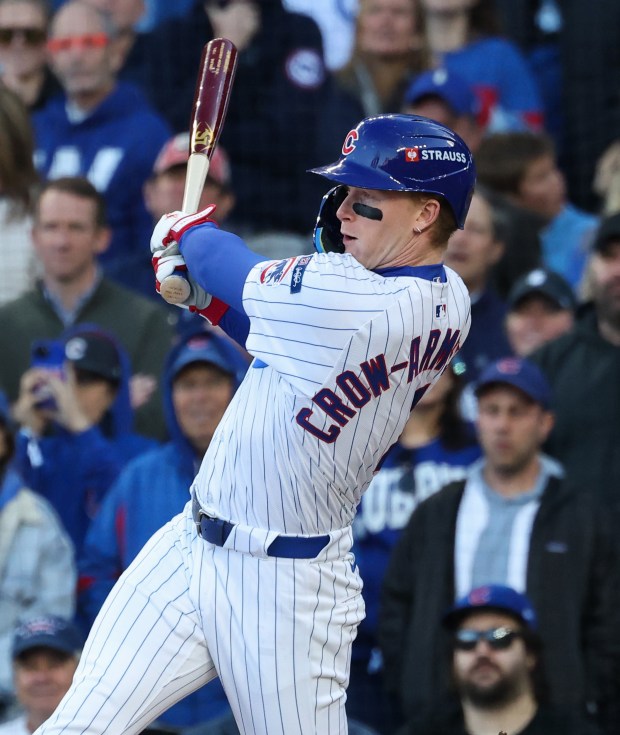 Cubs center fielder Pete Crow-Armstrong swings through on a two-run...