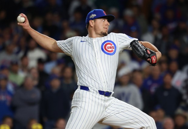 Cubs pitcher Brad Keller throws in the eighth inning against...