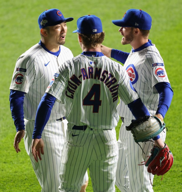 Cubs right fielder Seiya Suzuki, from left, center fielder Pete...