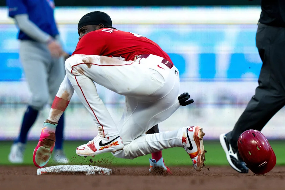 Reds shortstop Elly De La Cruz gathers himself after stealing second base in the second inning of the game against the Chicago Cubs at Great American Ball Park on Sept. 20. It was De La Cruz's 36th steal of the season.