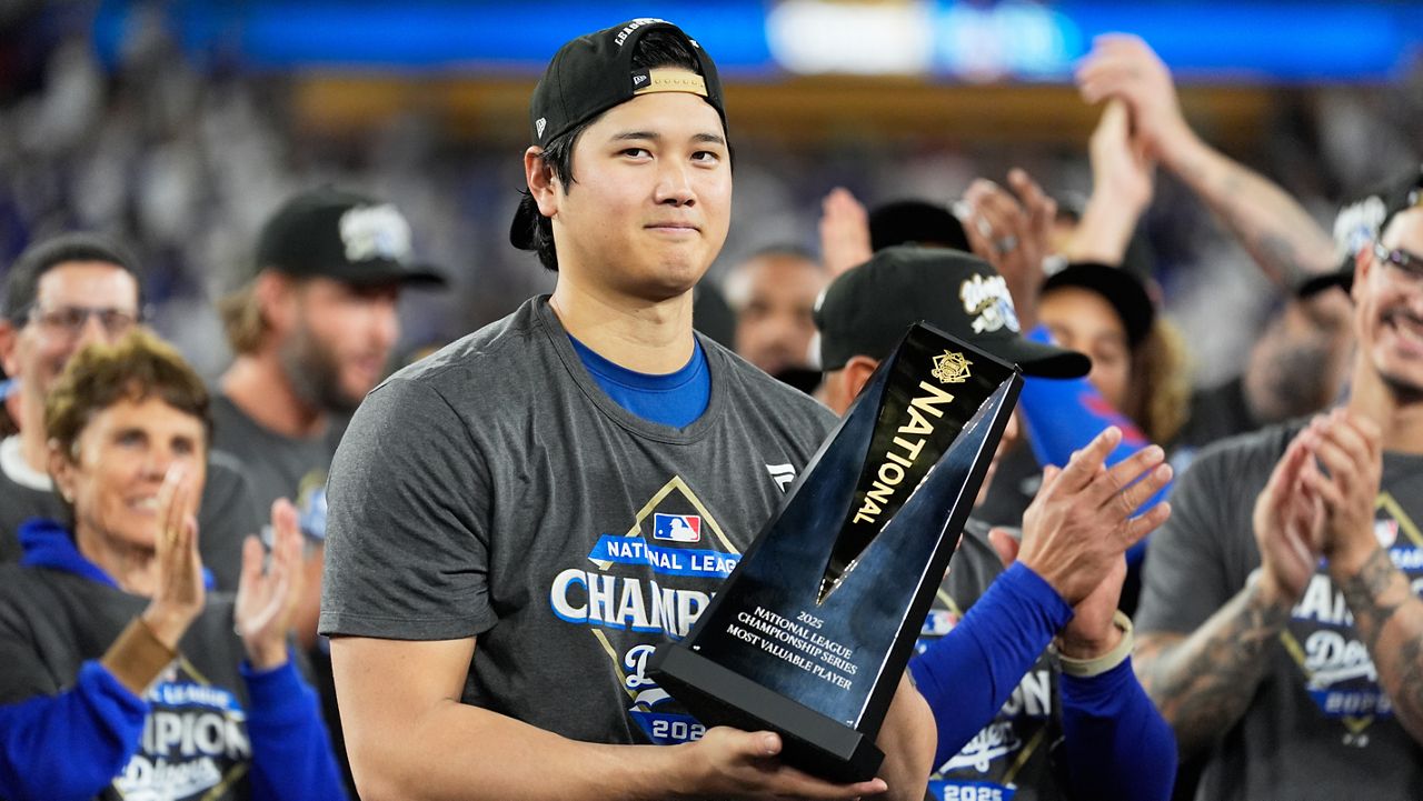Los Angeles Dodgers pitcher Shohei Ohtani celebrates their win against the Milwaukee Brewers in baseball's National League Championship Series, Friday, Oct. 17, 2025, in Los Angeles.