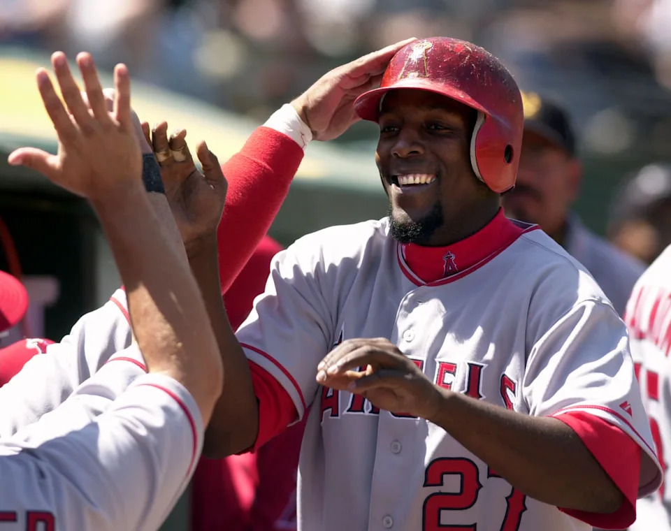 Angels star Vladimir Guerrero celebrates after hitting a home run against the Oakland Athletics in April 2004.