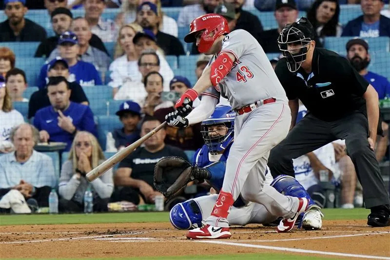 Sal Stewart of the Cincinnati Reds drives in two runs in the first inning