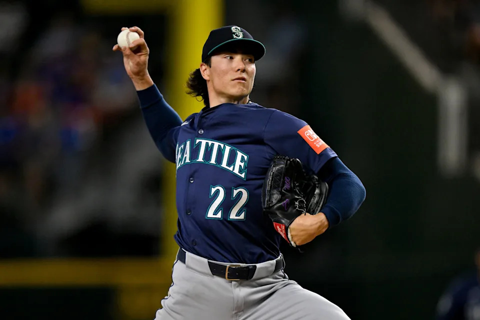 Seattle Mariners starting pitcher Bryan Woo (22) pitches against the Texas Rangers during the first inning at Globe Life Field in Arlington, Texas.
