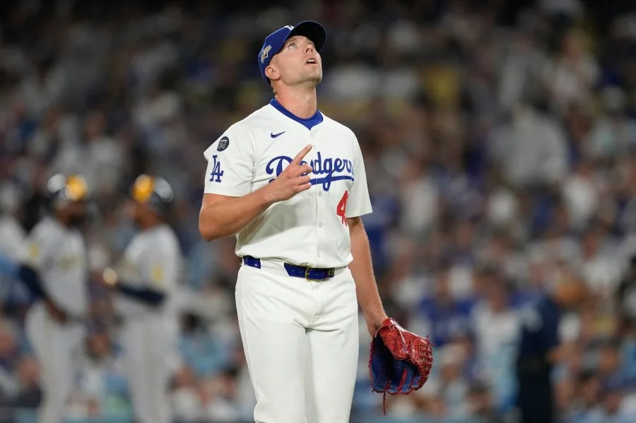 Los Angeles Dodgers pitcher Blake Treinen (49) celebrates after leaving the mound during Game 4 of baseball’s National League Championship Series against the Milwaukee Brewers, Friday, Oct. 17, 2025, in Los Angeles. (AP Photo/Ashley Landis)