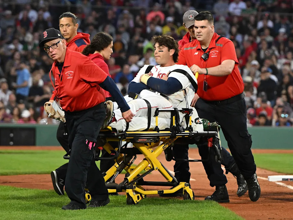 Triston Casas is taken off of the field on a stretcher after a collision at first base during the May 2 game against Minnesota. The injury ended his season.