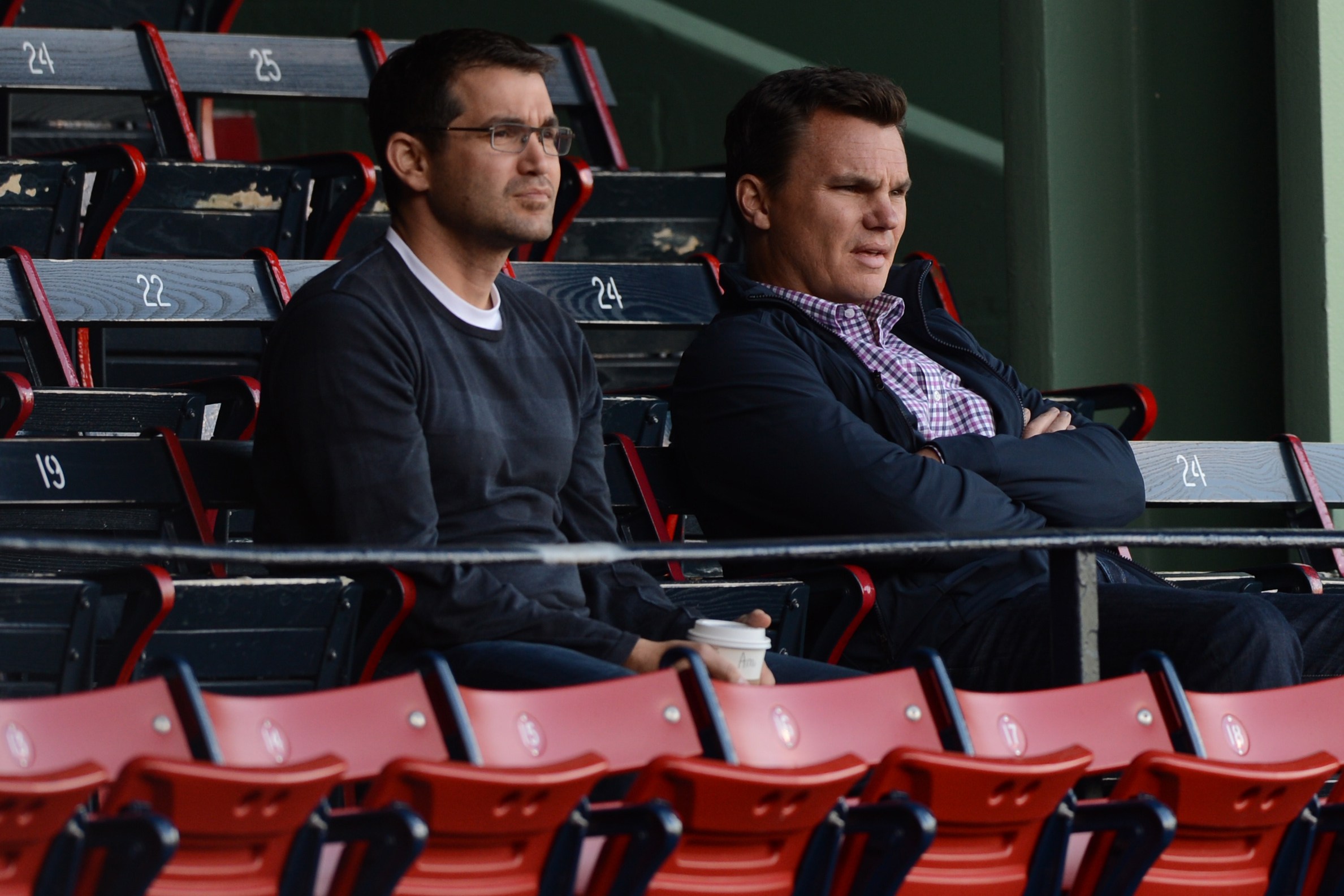 BOSTON, MA- OCTOBER 11: Boston Red Sox Director of Amateur Scouting Amiel Sawdaye, left and General Manager Ben Cherington watch batting team batting practice from the grandstand seats on October 11, 2013 at Fenway Park in Boston, Masschusetts. (Photo by Michael Ivins/Boston Red Sox/Getty Images)