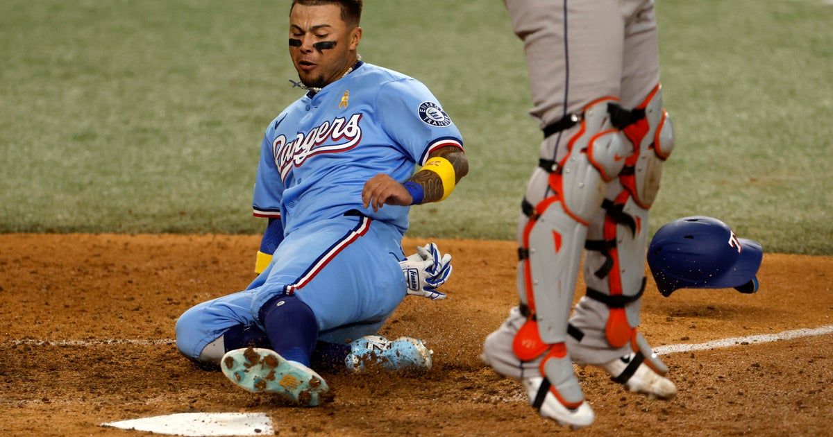 Rangers rally with Jake Burger's homer to beat Astros 4-2, stay in AL wild-card race