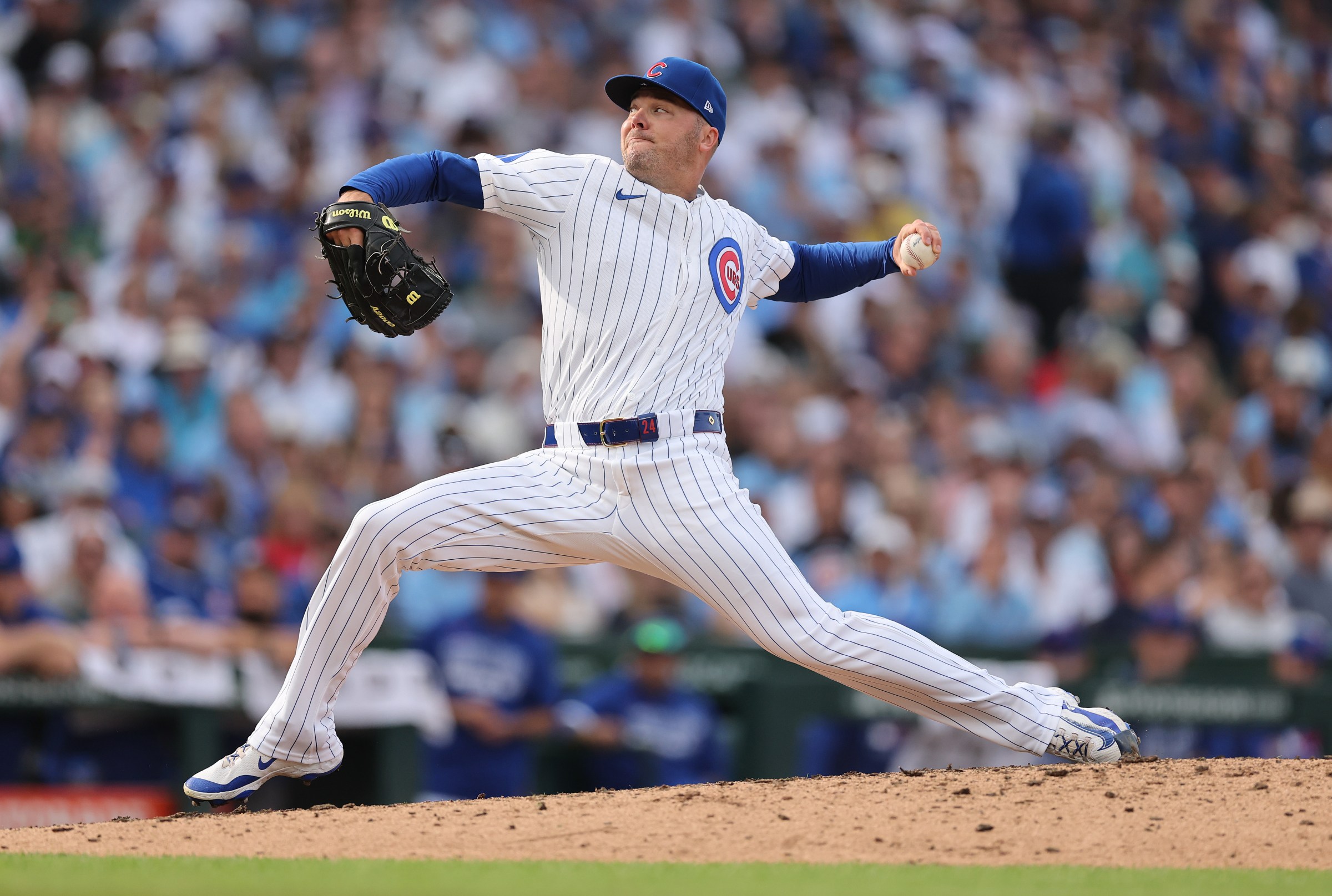 CHICAGO, ILLINOIS - OCTOBER 01: Caleb Thielbar #24 of the Chicago Cubs throws a pitch in the sixth inning against the San Diego Padres during game two of the National League Wild Card Series at Wrigley Field on October 01, 2025 in Chicago, Illinois. (Photo by Michael Reaves/Getty Images)