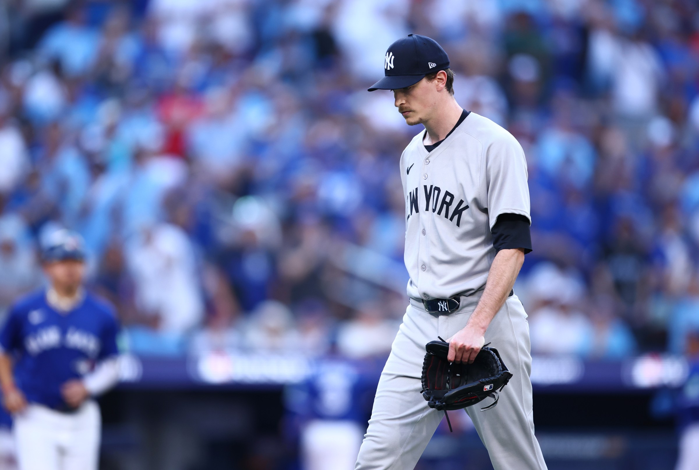 TORONTO, ONTARIO - OCTOBER 05: Max Fried #54 of the New York Yankees leaves the game during the fourth inning in game two of the American League Division Series against the Toronto Blue Jays at Rogers Centre on October 05, 2025 in Toronto, Ontario. (Photo by Vaughn Ridley/Getty Images)