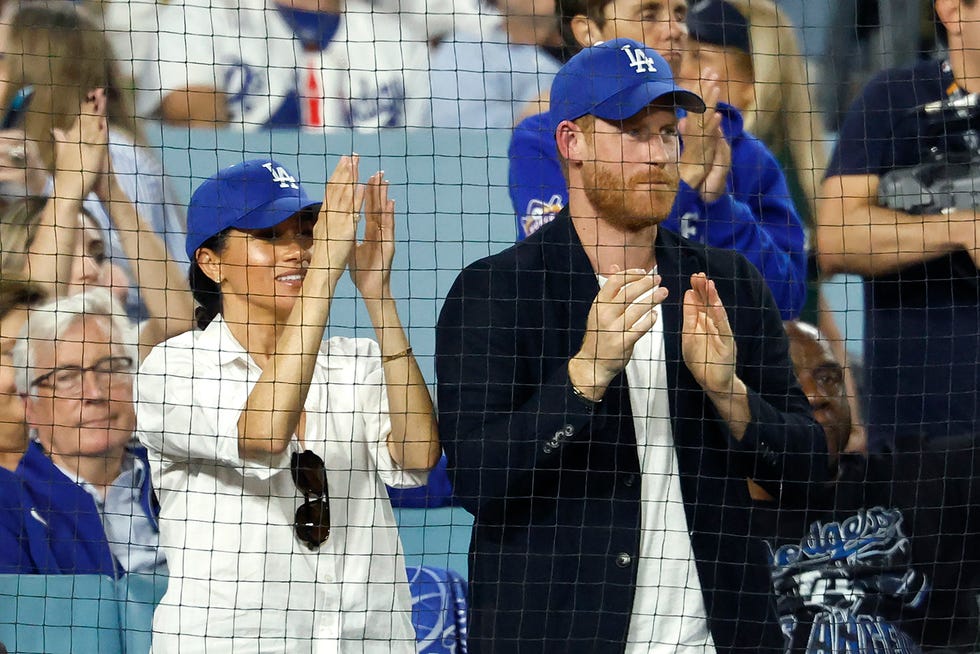 los angeles, california october 28: prince harry, duke of sussex and meghan, duchess of sussex react during the fifth inning of game four of the 2025 world series between the toronto blue jays and the los angeles dodgers at dodger stadium on october 28, 2025 in los angeles, california. (photo by ronald martinez/getty images)