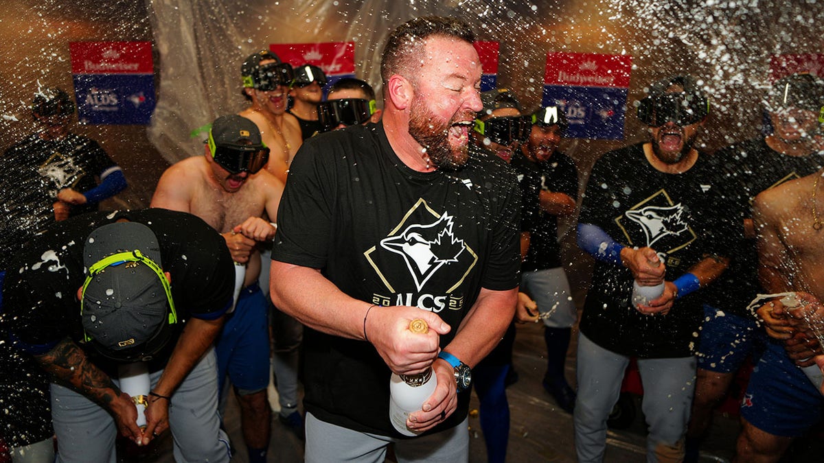 John Schneider celebrates