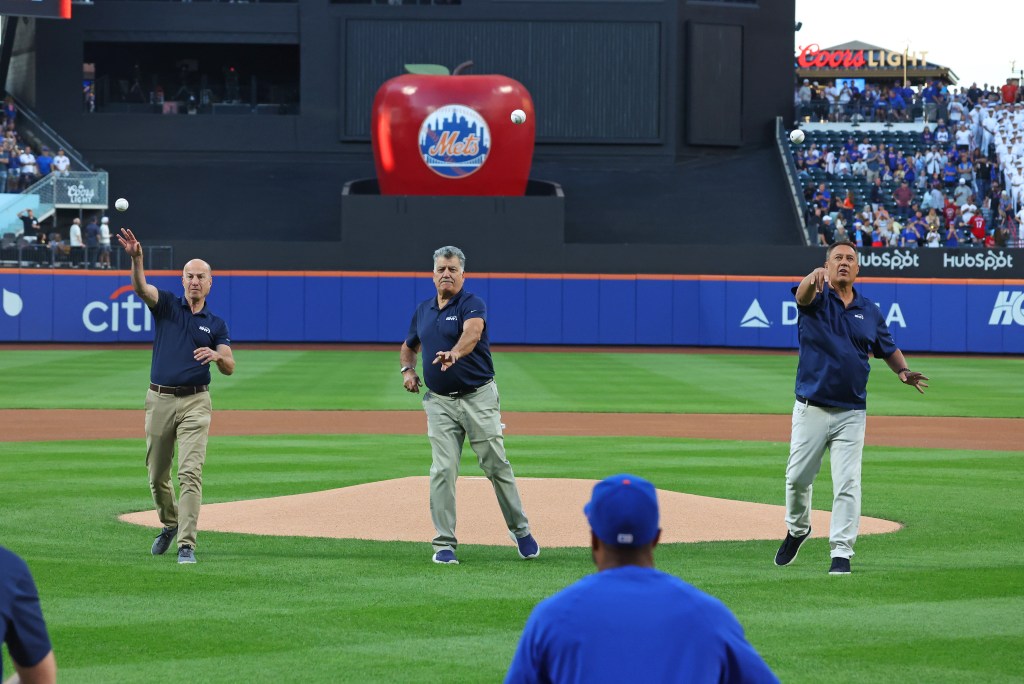 Mets announcers Gary Cohen, Keith Hernandez, and Ron Darling throwing out the ceremonial first pitches.