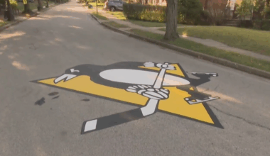 Painting the streets black and gold, Pittsburgh neighborhood shows sports pride in unique way