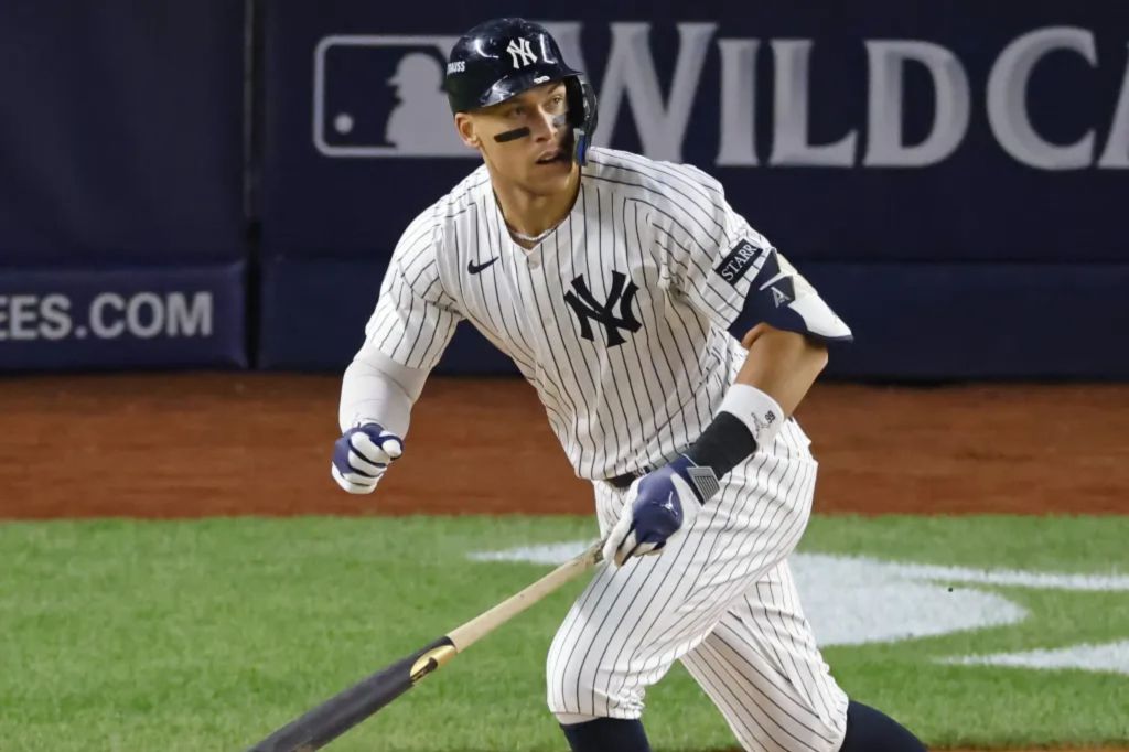 Aaron Judge hits an RBI single in the fifth inning of the Yankees' 4-3 win over the Red Sox on Game 2 of their AL wild-card series.