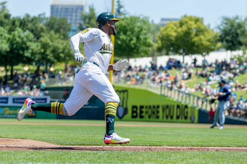 Oakland Athletics outfielder Miguel Andujar (22) goes home during the MLB professional baseball game between the Seattle Mariners and the Athletics on May 7, 2025 at Sutter Health Park in Sacramento, CA. (Photo by Bob Kupbens/Icon Sportswire via Getty Images)