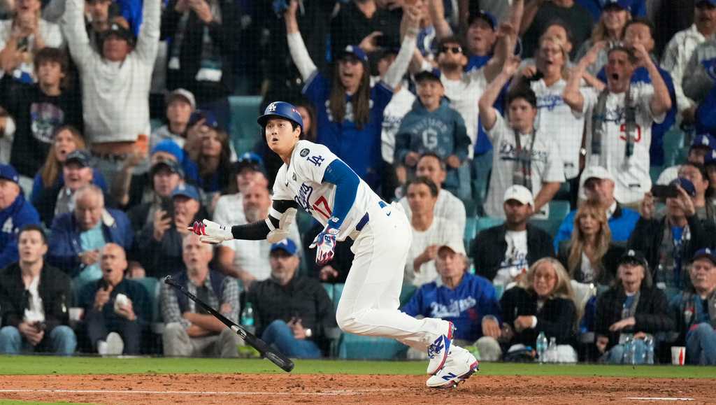 Shohei Ohtani homered twice and tied a 119-year-old major league record with four extra-base hits in Game 3 of the World Series, putting on yet another historic postseason show at Dodger Stadium