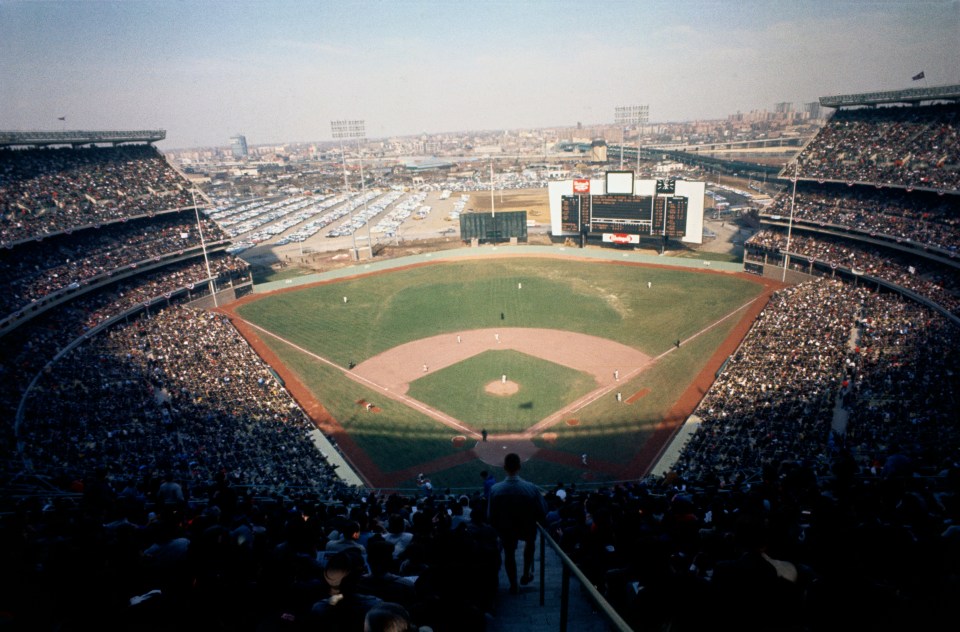 The opening day at Shea Stadium with crowd and field is shown.