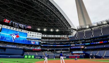 Who decides if Rogers Centre roof opens for Toronto Blue Jays playoff games?