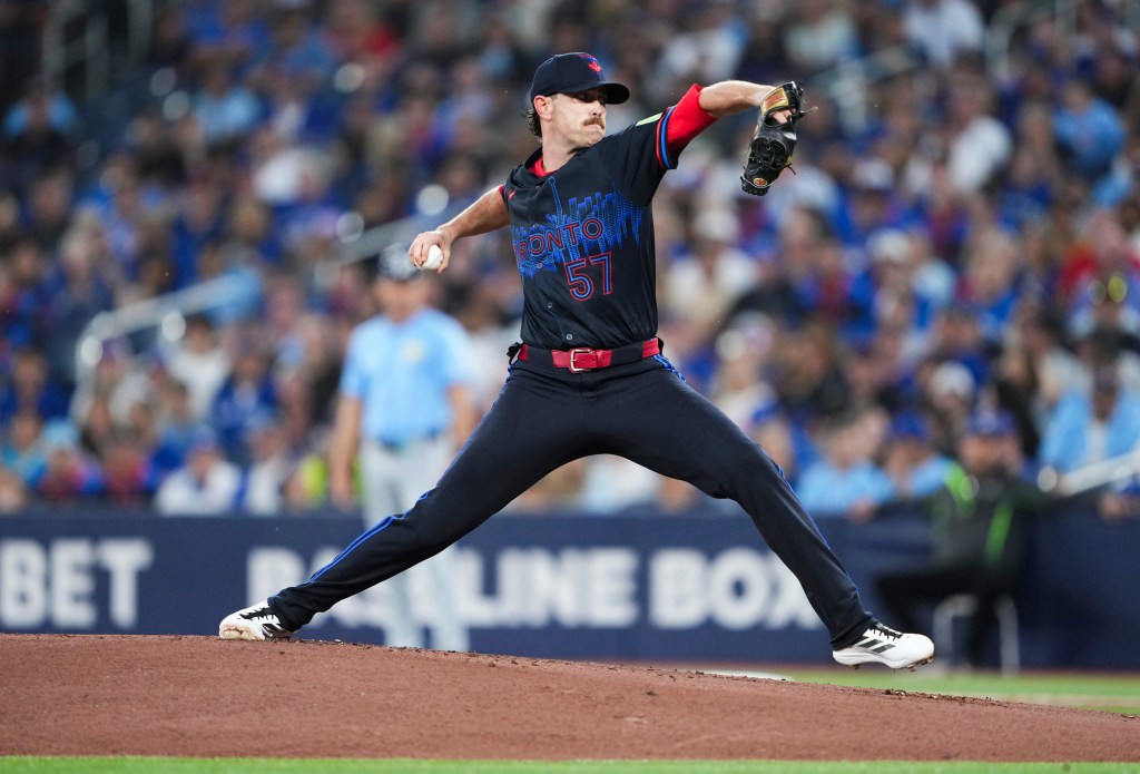 Shane Bieber, number 57 of the Toronto Blue Jays, pitches to the Tampa Bay Rays.