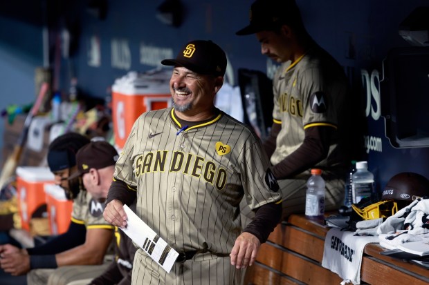 Padres pitching coach Ruben Niebla walks the dugout during Game 1 of the NL Division Series against the Dodgers. (K.C. Alfred/The San Diego Union-Tribune)