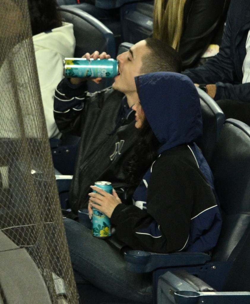 Kylie Jenner and Timothée Chalamet at the New York Yankees vs Toronto Blue Jays game.