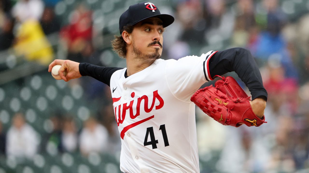 Minnesota Twins pitcher Joe Ryan throws to the Cleveland Guardians during the fourth inning of a baseball game that was suspended Monday because of rain and resumed, Wednesday, May 21, 2025, in Minneapolis.