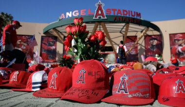 A makeshift shrine in honour of Los Angeles Angels pitcher Tyler Skaggs stands outside Angel Stadium before the team's baseball game against the Seattle Mariners on Friday, July 12, 2019, in Anaheim, Calif. (Marcio Jose Sanchez/AP)