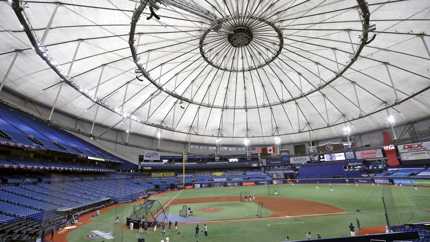 Manfred says Rays likely to restart ballpark site search after the team is sold