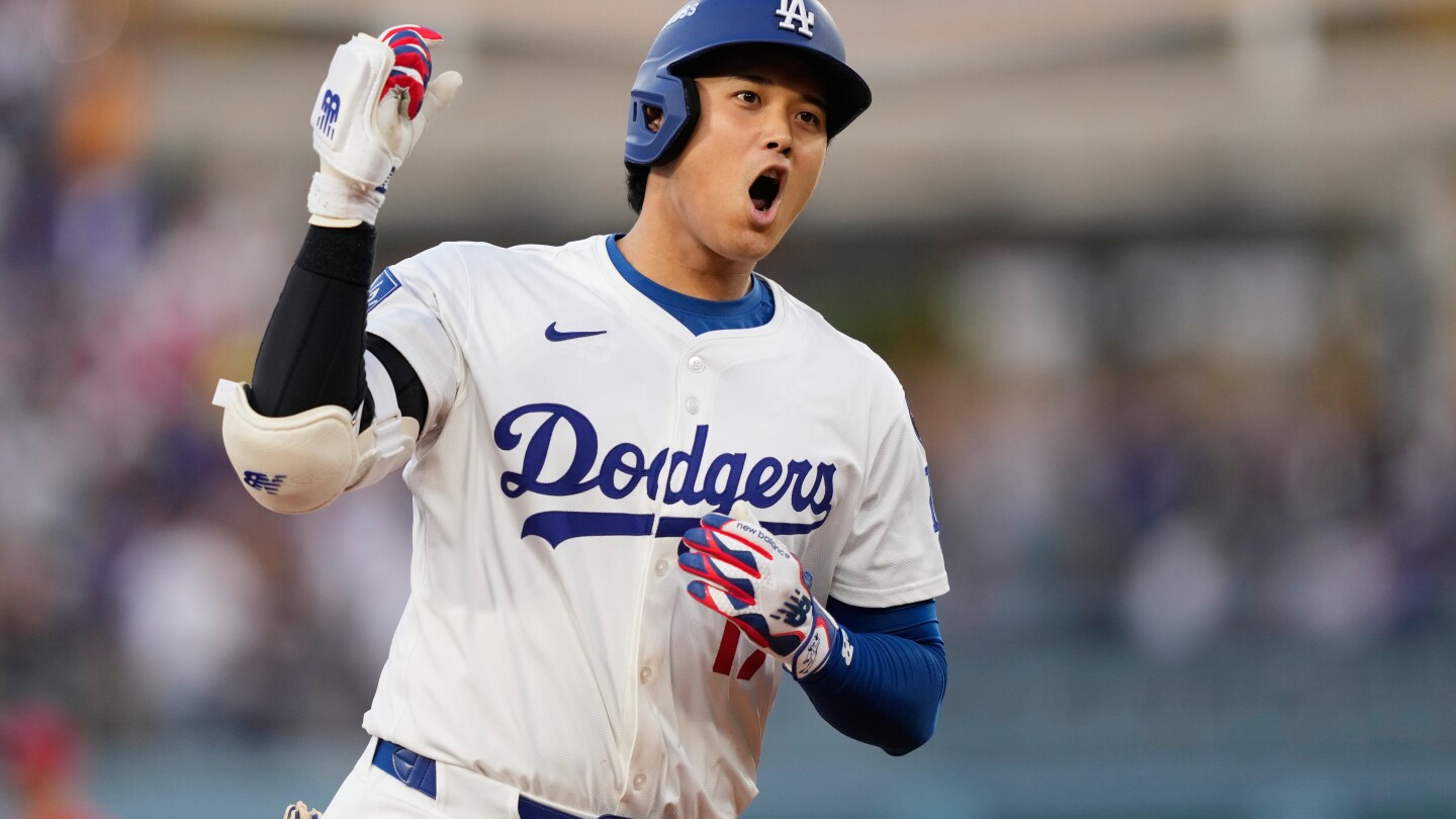 Shohei Ohtani hits 2 home runs for Dodgers in playoff opener against Reds