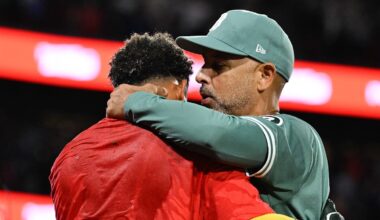 Sep 26, 2025; Boston, Massachusetts, USA; Boston Red Sox manager Alex Cora (right) hugs center fielder Ceddanne Rafaela (3) as they celebrate clinching a playoff spot after defeating the Detroit Tigers in the ninth inning at Fenway Park. Mandatory Credit: Eric Canha-Imagn Images