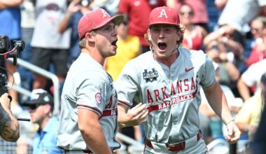 Jun 16, 2025; Omaha, Neb, USA;  Arkansas Razorbacks starting pitcher Gage Wood (14) celebrates with infielder Gabe Fraser (6) after throwing a no-hitter against the Murray State Racers at Charles Schwab Field. Mandatory Credit: Steven Branscombe-Imagn Images