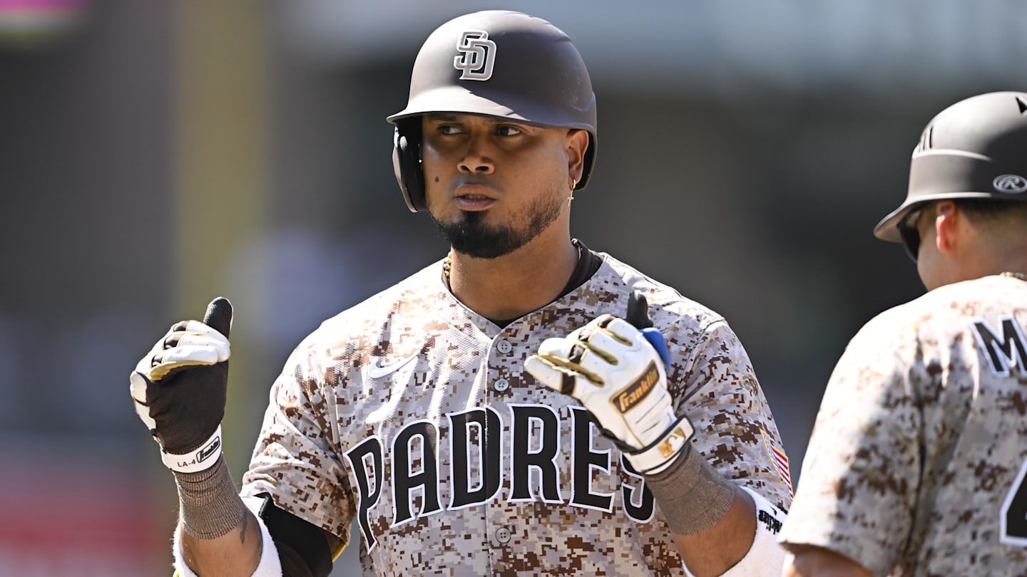 Aug 10, 2025; San Diego, California, USA; San Diego Padres first baseman Luis Arraez (4) gestures after hitting a single during the seventh inning against the Boston Red Sox at Petco Park. Mandatory Credit: Denis Poroy-Imagn Images