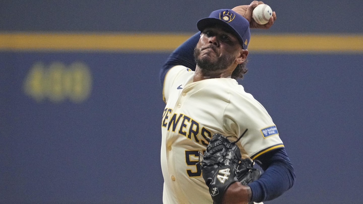 Oct 14, 2025; Milwaukee, Wisconsin, USA; Milwaukee Brewers pitcher Freddy Peralta (51) throws a pitch against the Los Angeles Dodgers in the first inning during game two of the NLCS round for the 2025 MLB playoffs at American Family Field.
