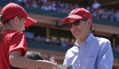 Jun 3, 2018; St. Louis, MO, USA; St. Louis Cardinals principal owner and chairman Bill DeWitt Jr. signs an autograph for a young fan during the seventh inning against the Pittsburgh Pirates at Busch Stadium. Mandatory Credit: Scott Rovak-Imagn Images