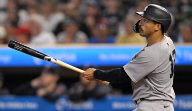 Sep 17, 2025; Minneapolis, Minnesota, USA;  New York Yankees outfielder Trent Grisham (12) flies out against the Minnesota Twins during the sixth inning at Target Field.