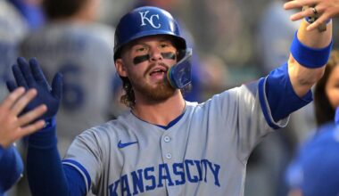 Sep 23, 2025; Anaheim, California, USA;  Kansas City Royals shortstop Bobby Witt Jr. (7) is greeted in the dugout after scoring during the first inning against the Los Angeles Angels at Angel Stadium. Mandatory Credit: Jayne Kamin-Oncea-Imagn Images