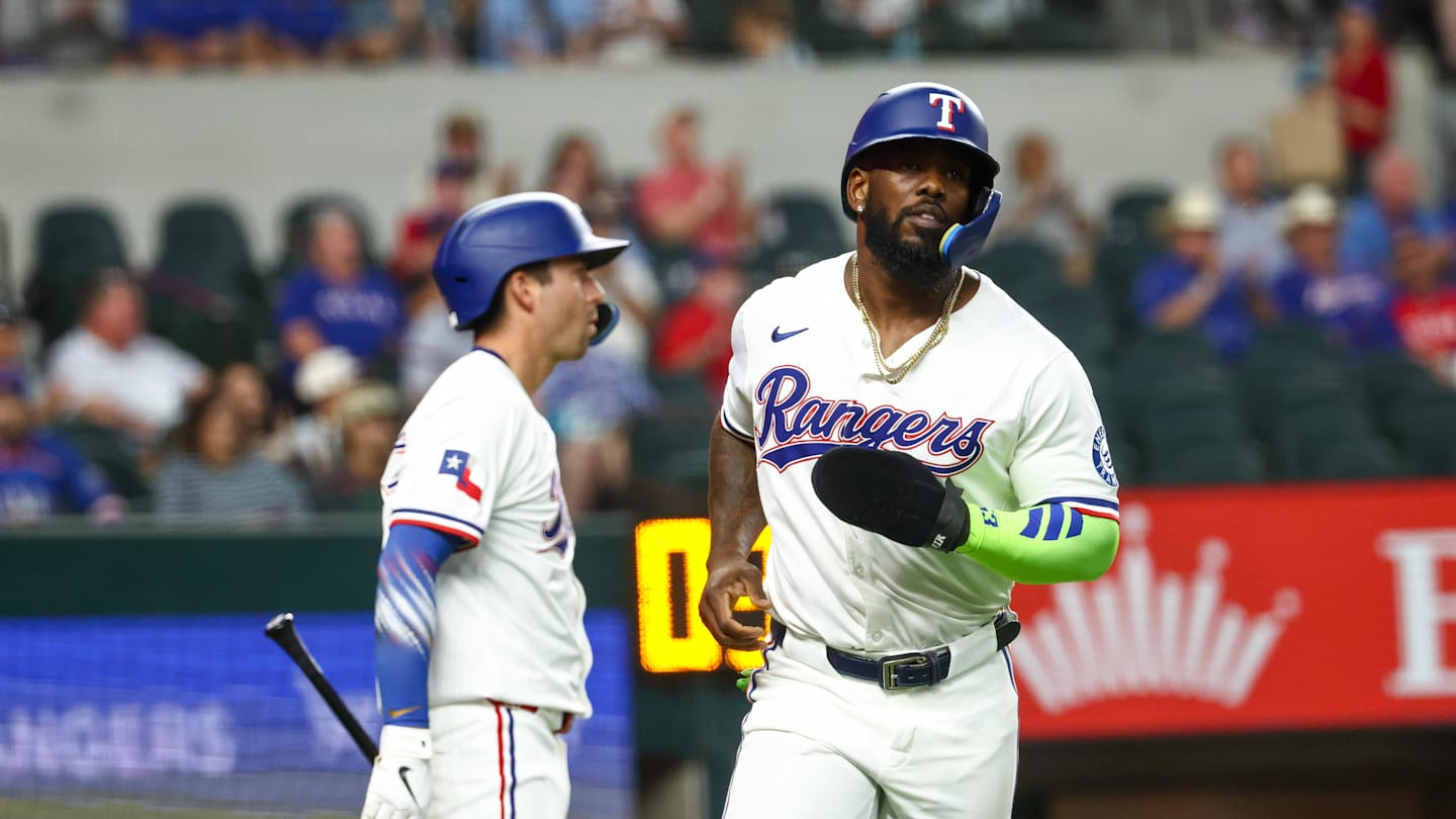 Aug 26, 2025; Arlington, Texas, USA; Texas Rangers right fielder Adolis Garcia (53) reacts after scoring during the first inning against the Los Angeles Angels at Globe Life Field. Mandatory Credit: Kevin Jairaj-Imagn Images