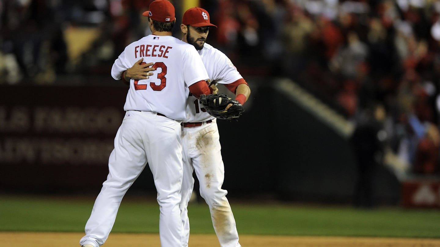 Oct 18, 2012; St. Louis, MO, USA; St. Louis Cardinals first baseman Matt Carpenter (13) celebrates defeating the San Francisco Giants with third baseman David Freese (23) during game four of the 2012 NLCS at Busch Stadium.  The St. Louis Cardinals won 8-3. Mandatory Credit: Jeff Curry-Imagn Images