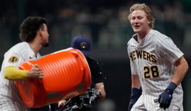 Milwaukee Brewers shortstop Willy Adames (27) dumps gatorade on center fielder Joey Wiemer (28) after he hit a sacrifice fly to Kansas City Royals center fielder Jackie Bradley Jr. (41) allowing Brewers right fielder Brian Anderson (9) to score during the ninth inning on Saturday May 13, 2023 at American Family Field in Milwaukee, Wis.