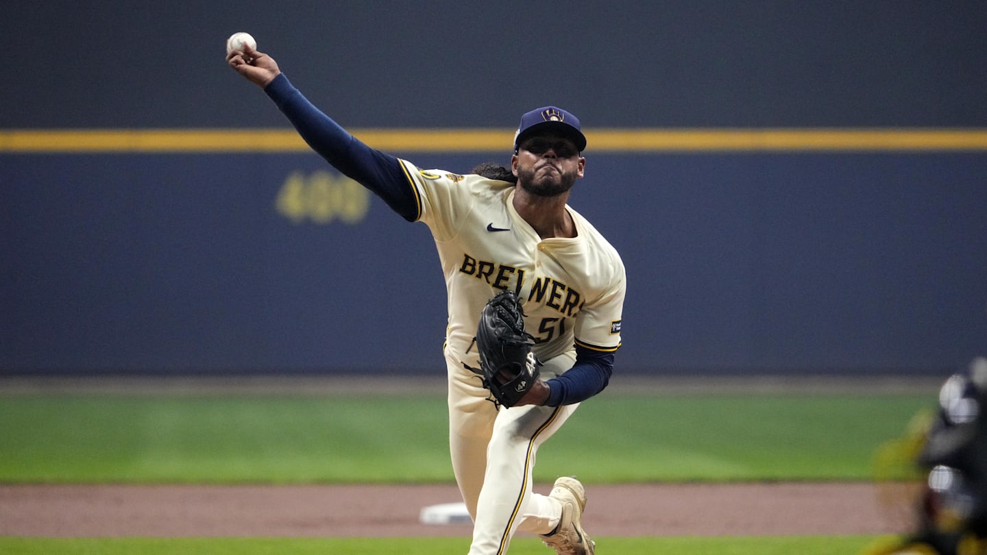 Oct 14, 2025; Milwaukee, Wisconsin, USA; Milwaukee Brewers pitcher Freddy Peralta (51) throws pitch against the Los Angeles Dodgers in the first inning during game two of the NLCS round for the 2025 MLB playoffs at American Family Field. Mandatory Credit: Michael McLoone-Imagn Images