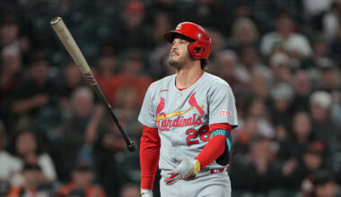 Los Angeles Angels designated hitter Mike Trout looks on from the dugout during the first inning against the Twins