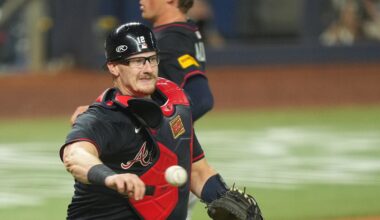 Aug 26, 2025; Miami, Florida, USA;  Atlanta Braves catcher Sean Murphy (12) throws out Miami Marlins right fielder Jakob Marsee (87) in the fifth inning at loanDepot Park. Mandatory Credit: Jim Rassol-Imagn Images