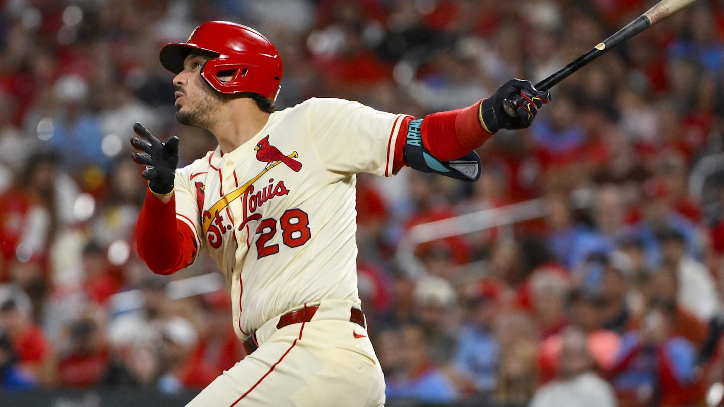 Sep 20, 2025; St. Louis, Missouri, USA; St. Louis Cardinals third baseman Nolan Arenado (28) hits a one run single against the Milwaukee Brewers during the fourth inning at Busch Stadium.