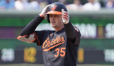 Aug 1, 2025; Chicago, Illinois, USA; Baltimore Orioles catcher Adley Rutschman (35) gestures after hitting a double against the Chicago Cubs during the ninth inning at Wrigley Field. Mandatory Credit: David Banks-Imagn Images