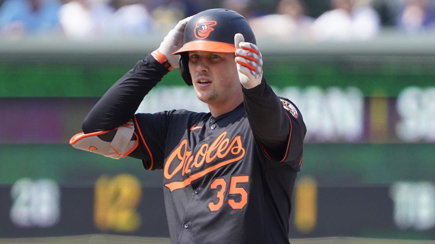 Aug 1, 2025; Chicago, Illinois, USA; Baltimore Orioles catcher Adley Rutschman (35) gestures after hitting a double against the Chicago Cubs during the ninth inning at Wrigley Field. Mandatory Credit: David Banks-Imagn Images